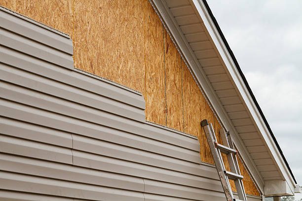 Professional Emergency Siding Repair technician working in Arlington Heights, PA